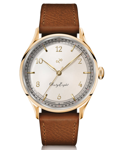 About Vintage 1968 Gold / White Watch