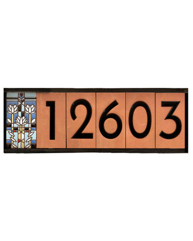 Decorative house number sign with '12603' on a white background