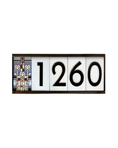 House number sign with '1260' and decorative elements on a white background